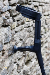 Top of black camo designed crutch with moulded handle