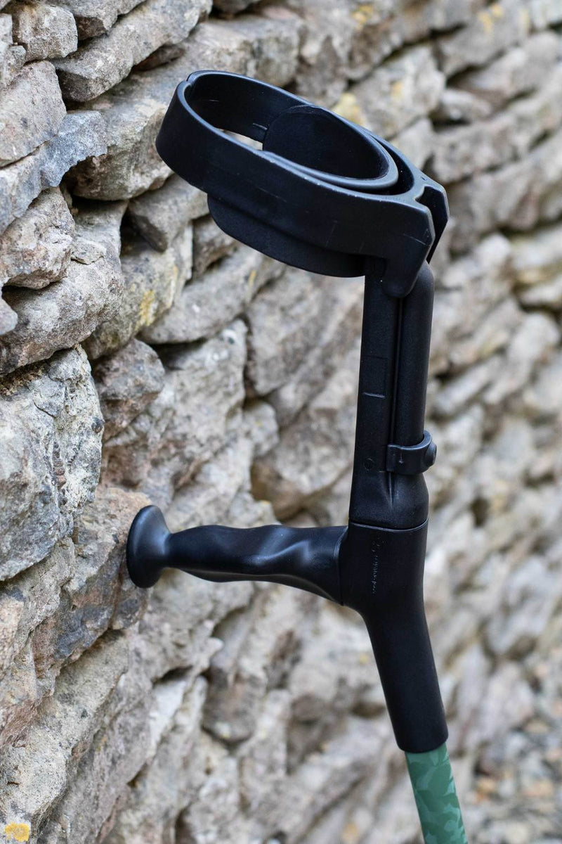 Green camo designed adjustable crutch showing cuff and moulded handle