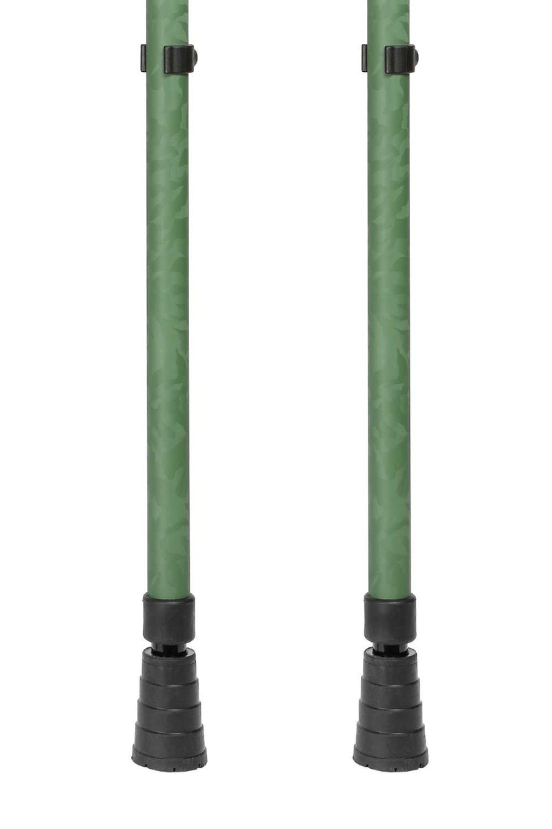 Bottom of green camo designed pair of adjustable crutches showing ferrules