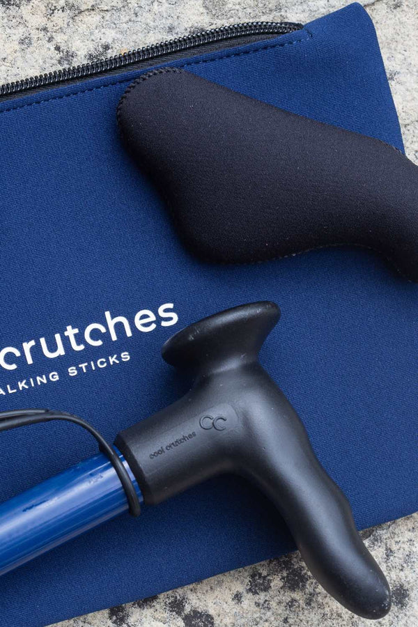 Navy Blue folding walking stick by cool crutches with ergonomic handle, soft grip cover and neoprene travel bag