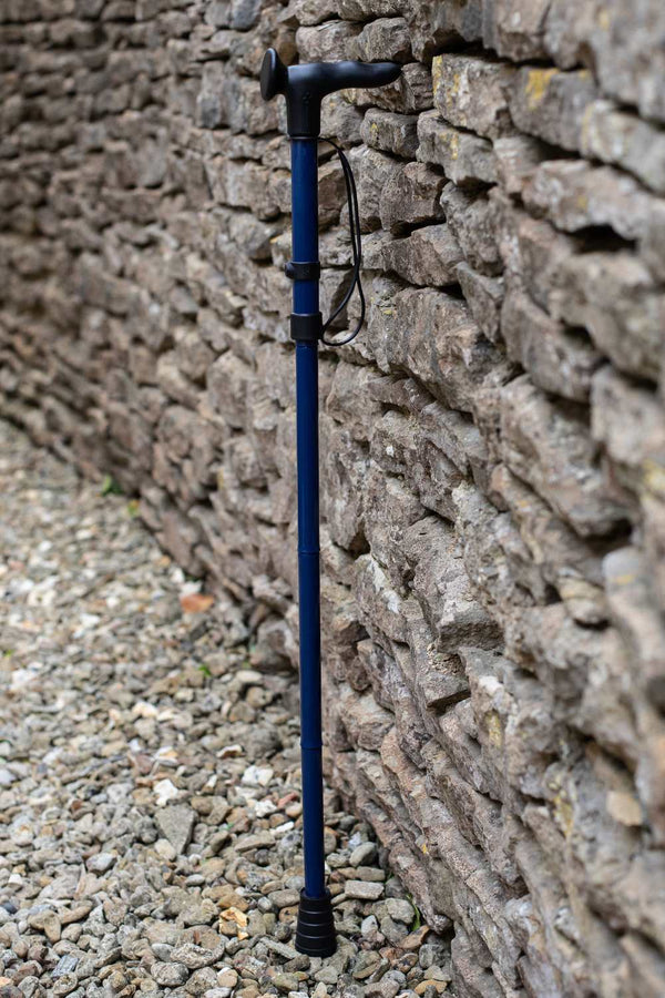 Navy Blue folding walking stick by cool crutches with ergonomic handle and supportive ferrule