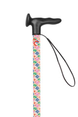 Colorful floral-patterned walking cane with black handle and wrist strap on a white background