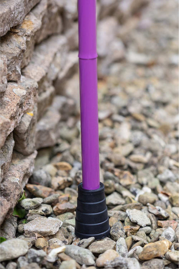 Purple folding walking stick by cool crutches showing supportive ferrule

