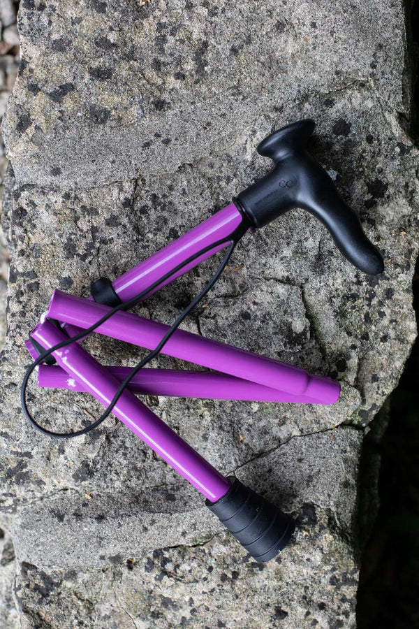 Purple folding walking stick by cool crutches