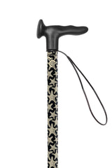Black walking cane with star pattern and wrist strap on a white background